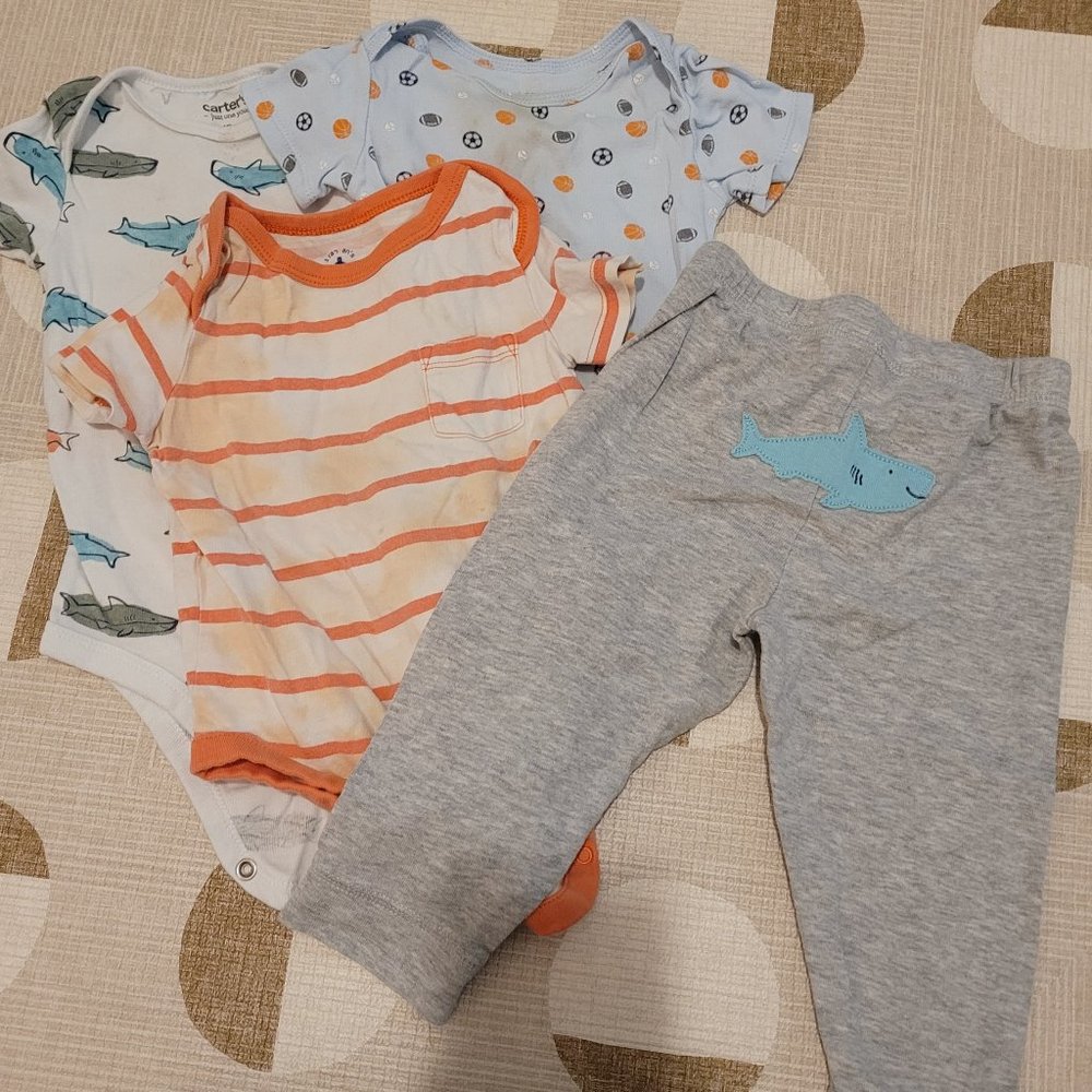 Three onesies and shark pants